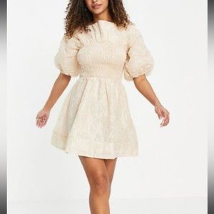 ASOS DESIGN JACQUARD SHIRRED MINI SKATER DRESS WITH BOW BACK
